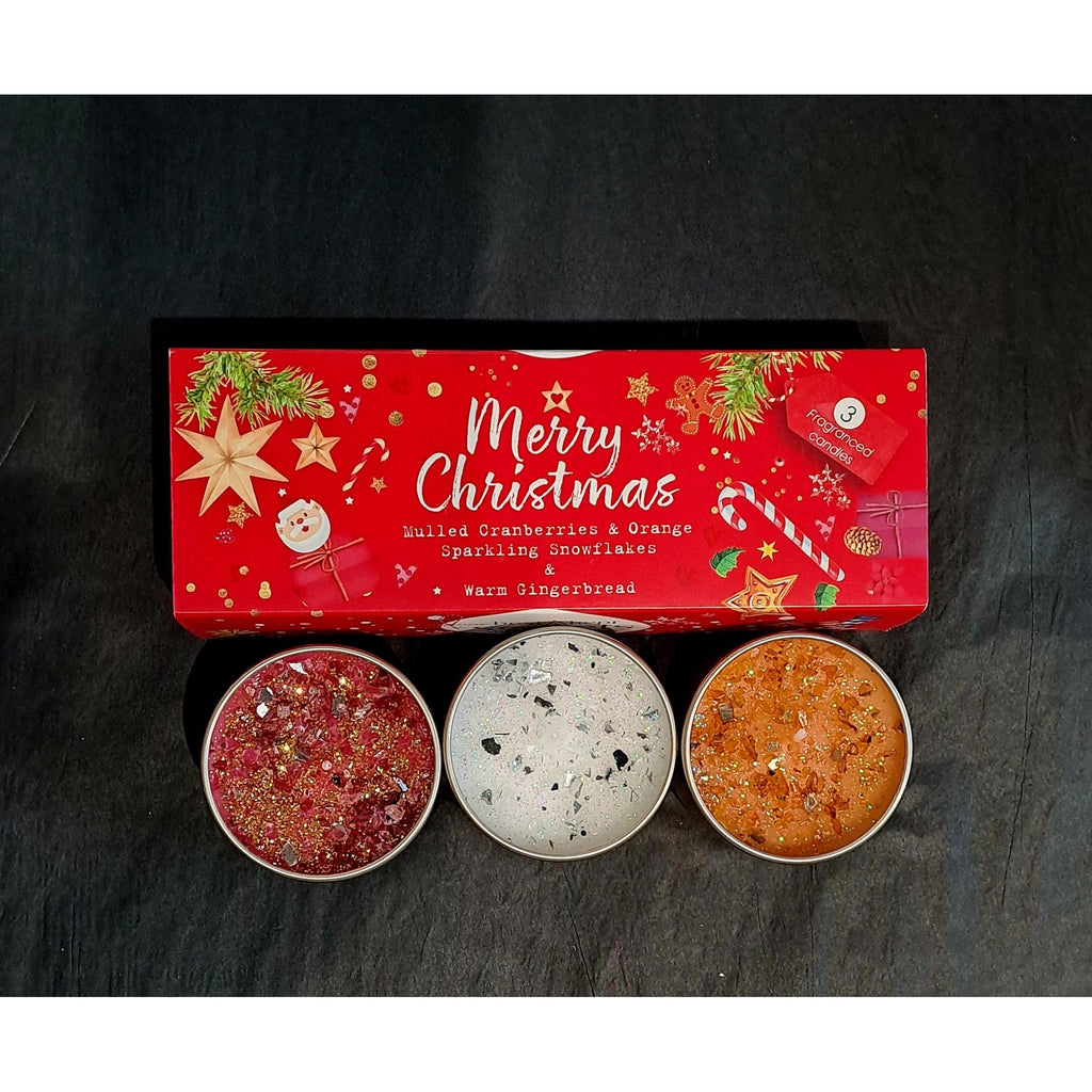 A Trio Of Christmas Scented Small Candles