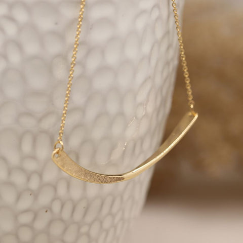 Golden Swoop Pendant Necklace