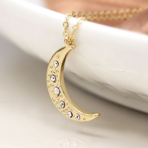 Gold Necklace With A Crescent Moon