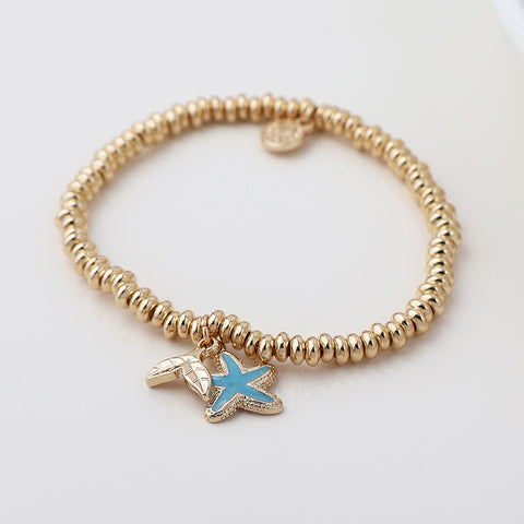 Golden Whale Tail and Starfish Charm Bracelet