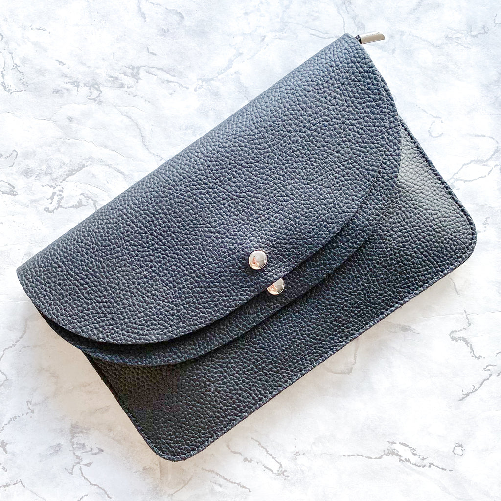 Silver clutch store with wrist strap