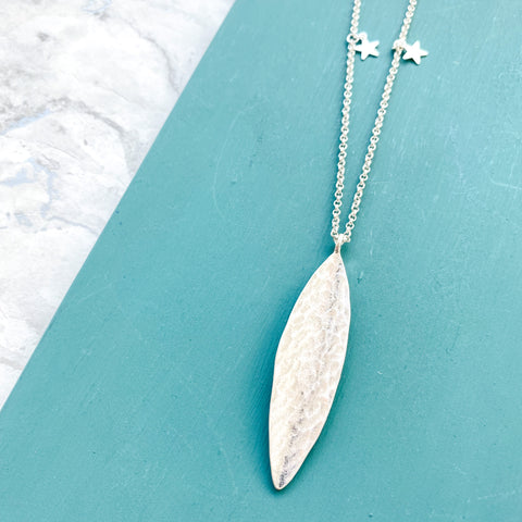Silver Hammered Long Leaf Necklace With Stars On The Chain